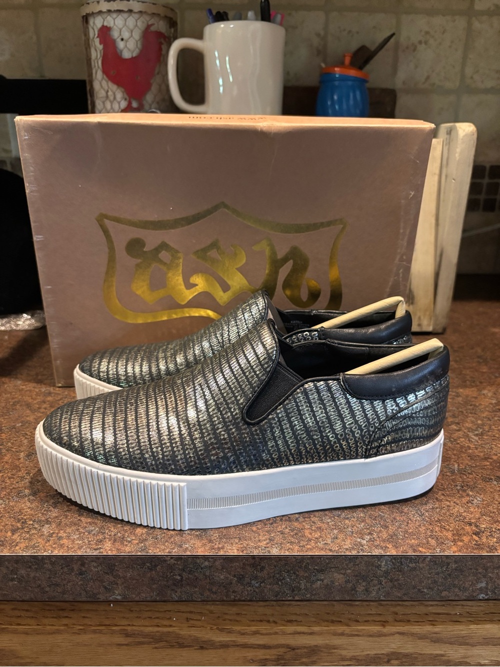 Ash Metallic Black Slip-On Platform Sneakers